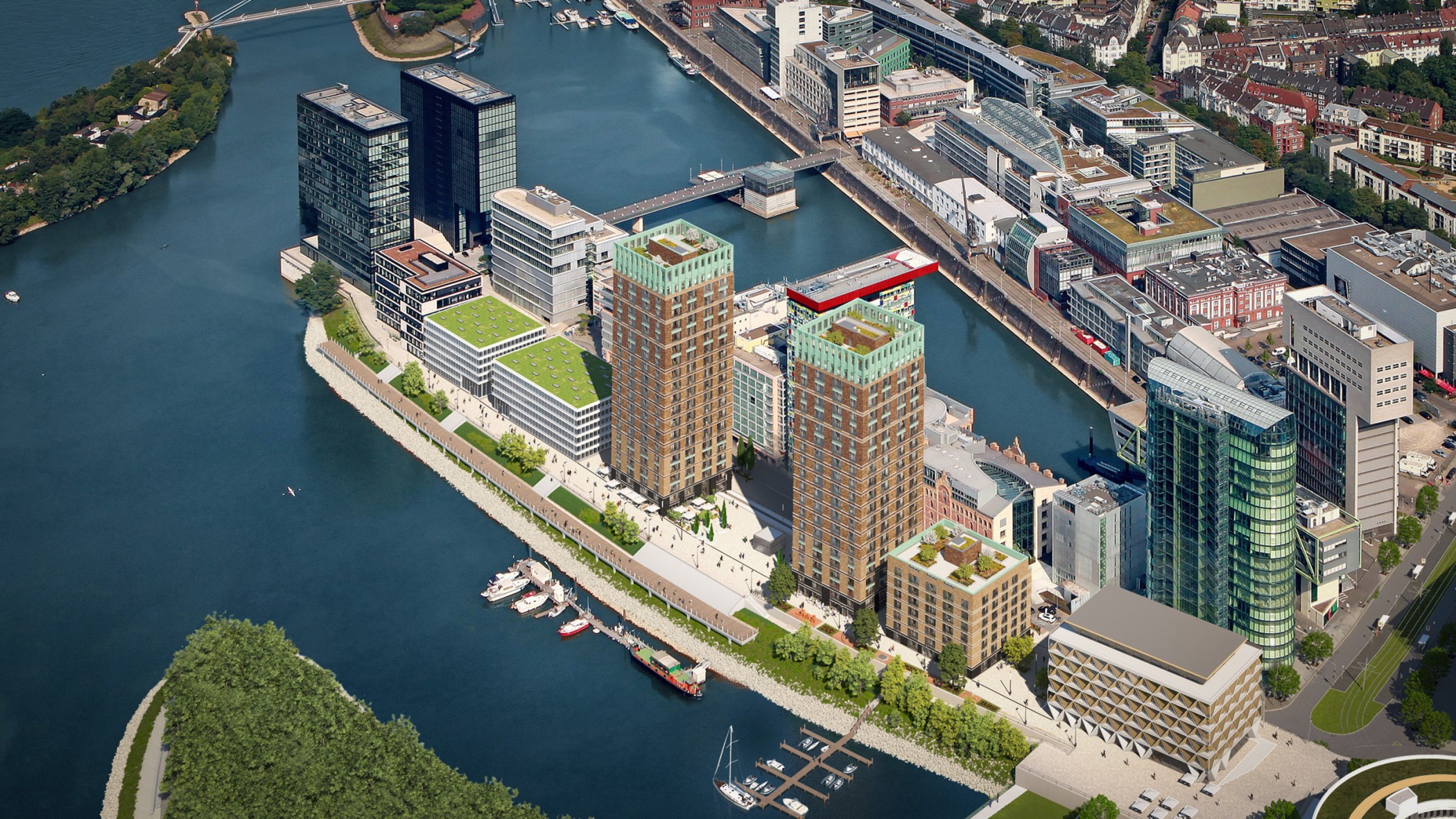 Luftaufnahme des Medienhafens Düsseldorf mit den WIN WIN Türmen und Blick über die Stadt aus westlicher Perspektive.