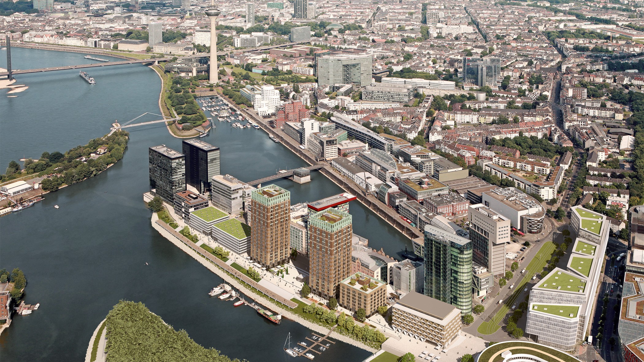 Luftaufnahme des Medienhafens Düsseldorf mit den WIN WIN Türmen und Blick über die Stadt aus westlicher Perspektive.