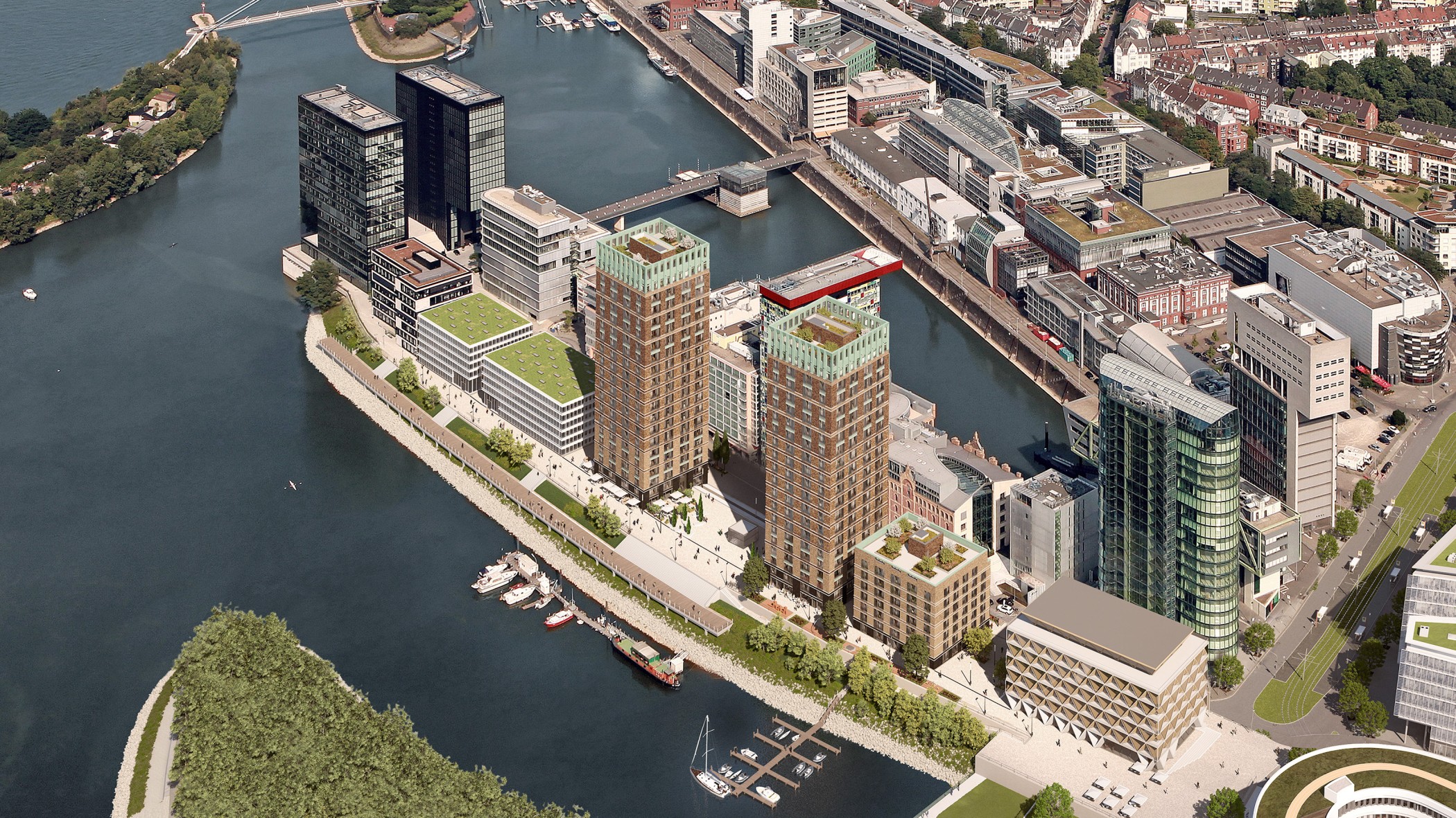 Luftaufnahme des Medienhafens Düsseldorf mit den WIN WIN Türmen und Blick über die Stadt aus westlicher Perspektive.