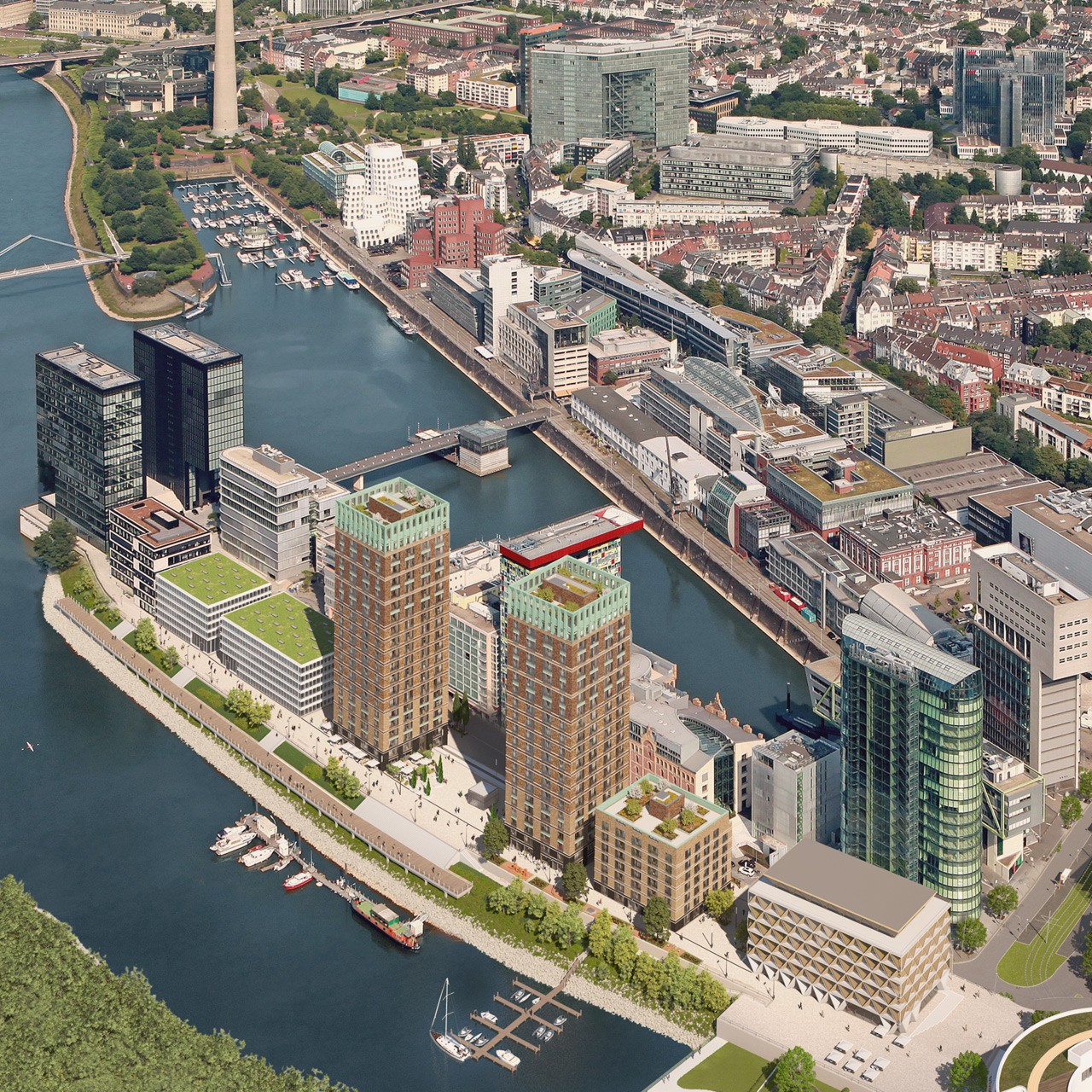 Luftaufnahme des Medienhafens Düsseldorf mit den WIN WIN Türmen und Blick über die Stadt aus westlicher Perspektive.